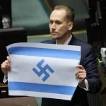 Polish lawmaker swastika flag