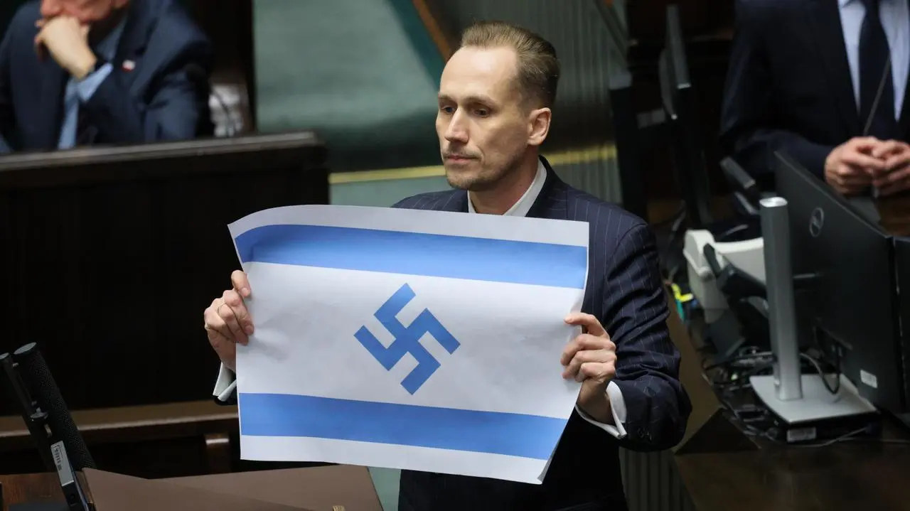 Polish lawmaker swastika flag